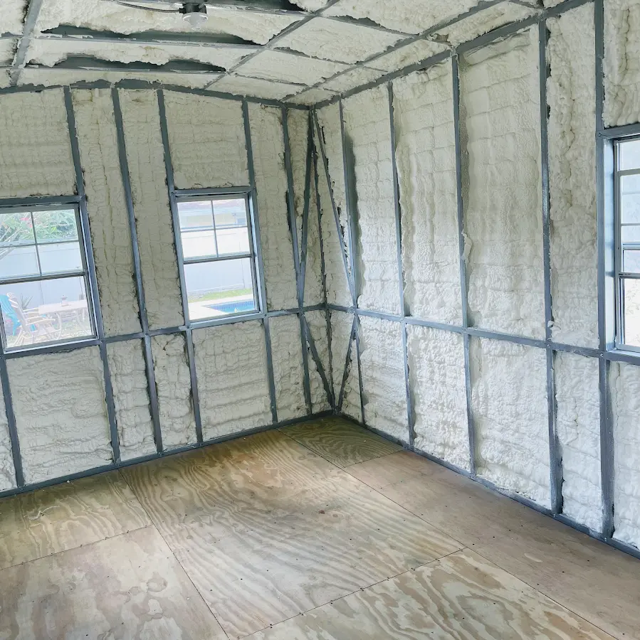 Closed-cell spray foam insulation applied to wall cavities in a residential project in Indian Hills